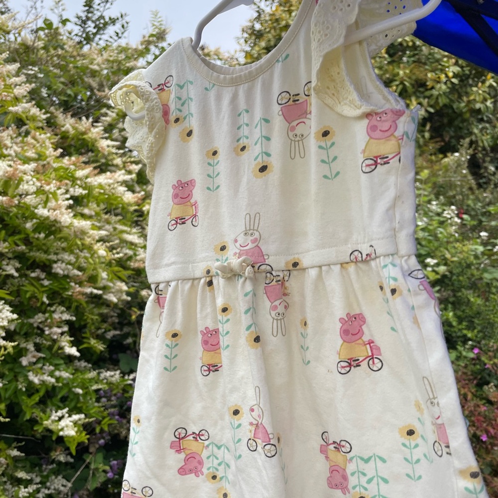Peppa Pig riding a bicycle Shirt in light yellow